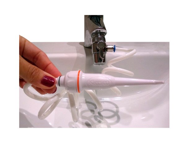 Irrigador oral. Montado en tu lavamanos, práctico y fácil de usar